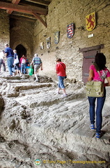 Marksburg Castle - Riders' Stairway. The wall displays coats of arms of various Marksburg owners